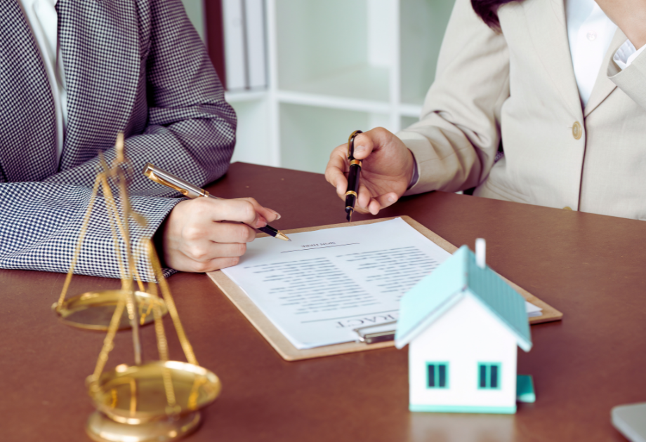 two people reviewing documents